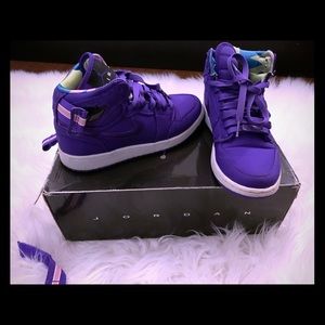 Purple Jordan’s with strap